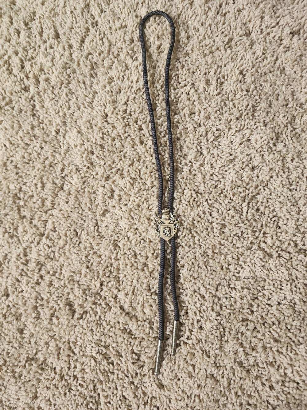 Western Style Bolo Tie with Metal Crest